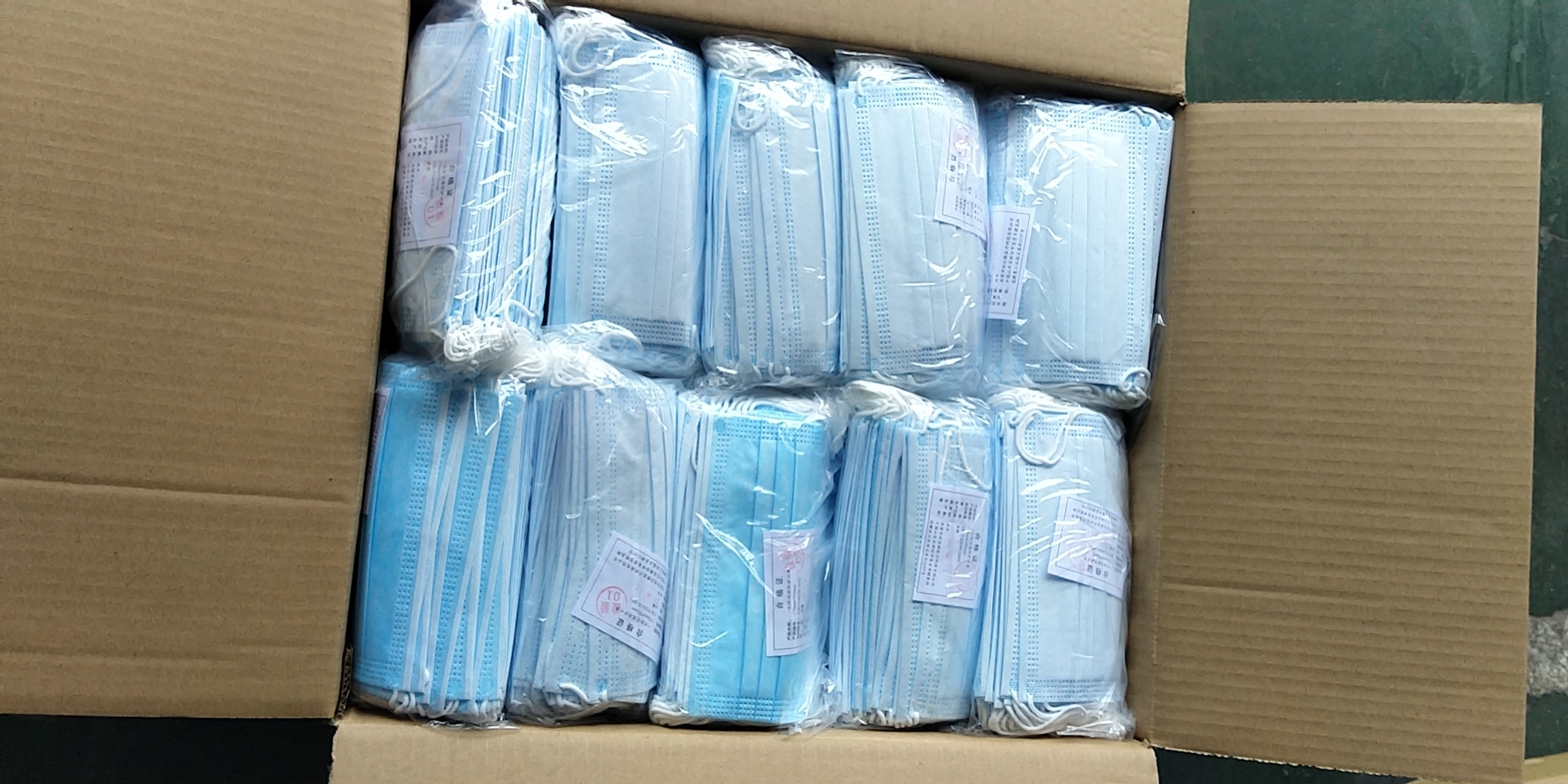 防疫物資出口，防護(hù)口罩出口人工檢驗(yàn)放行現(xiàn)場圖；東勝物流